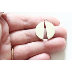 Sterling Silver Circle Pendant with Long Triangle Cutout